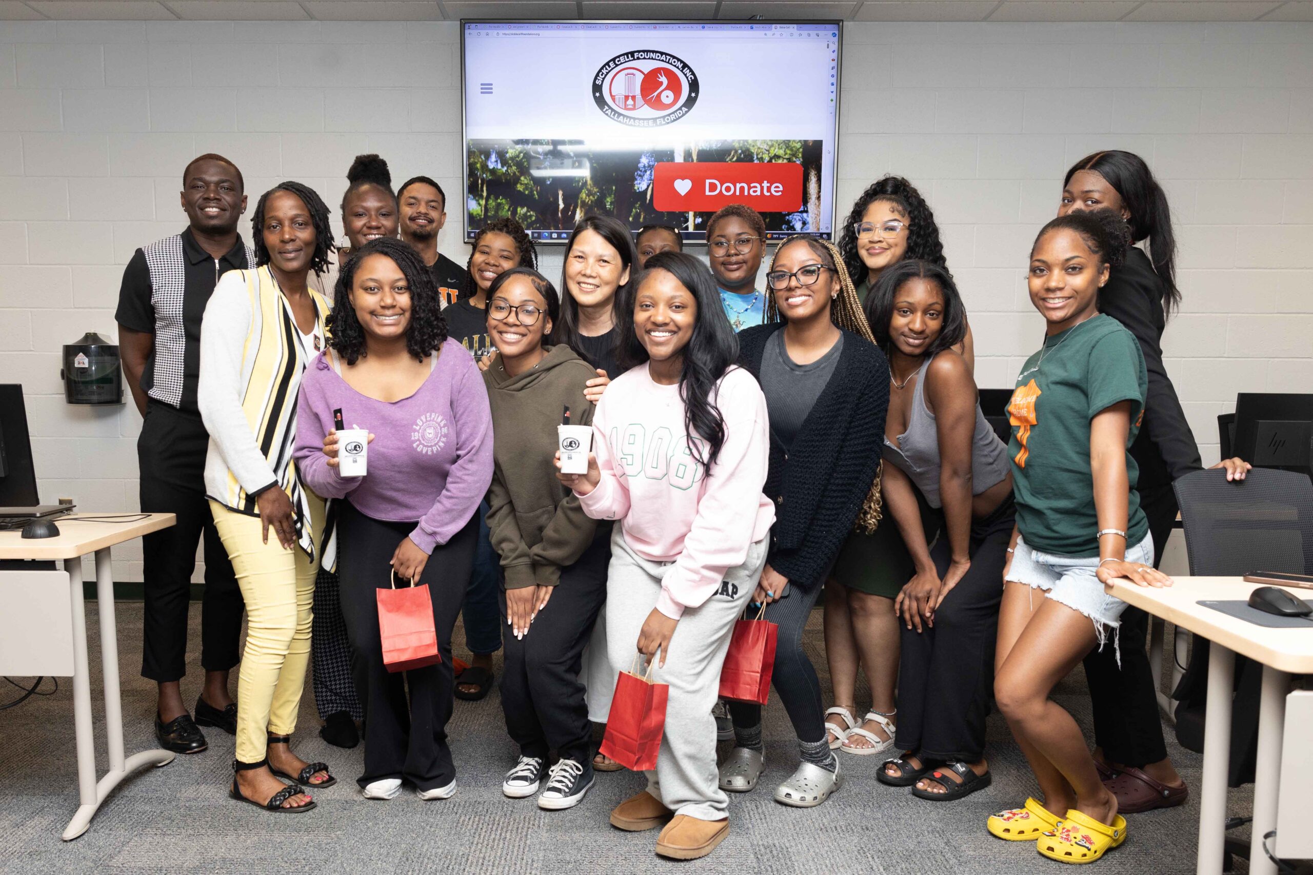 Joshua Morain, SCF staff members Latoya Stevens and Janay Perry, Jayda Nelms,  Jalen Ellis, Aniya Gaines, Nionie Spurgeon, Professor Hsuan Huang, Ph.D., Nadia Lloyd, Kalah Steward, Zaria Slaughter, Jasmine Mention, Loryn Carter, Mia Dingle and Jayla Royal pose together after completing the FAMU SJGC public relations challenge.