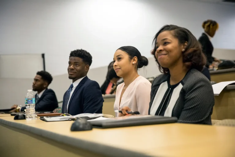 Students attend class in the SJGC Lecture Hall.