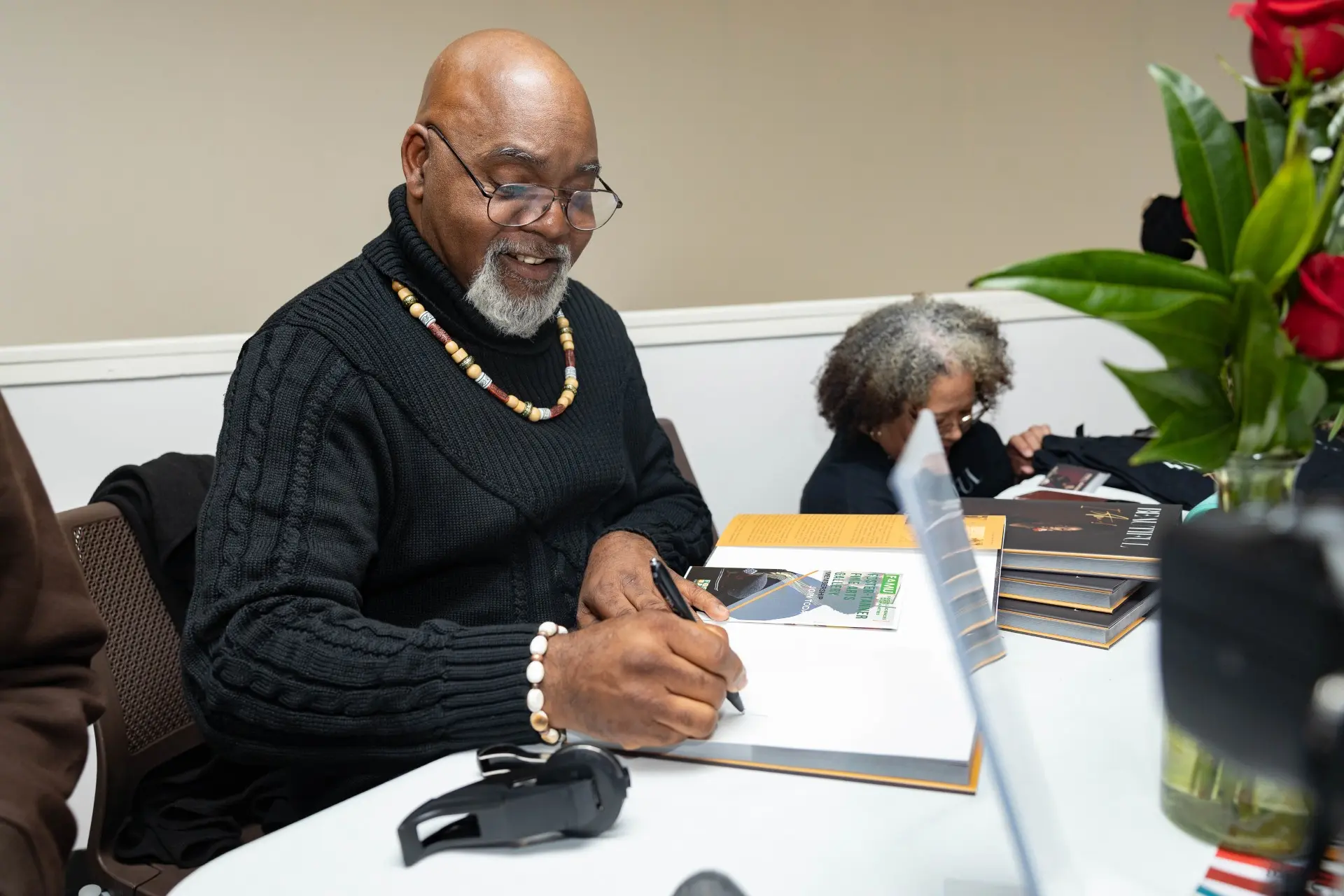 Author and SJGC Visiting Professor Stanley Johnson Celebrates Black Women in New Book Stanley Johnson autographs his empowering new book 'Beautiful, I Am' during a recent signing event.