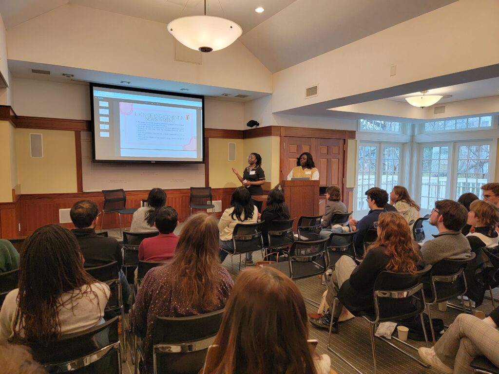 Cynthia Frage (left) and Micah Barkley (right) speak to fellow student journalists during the Christopher J. Georges Conference on College Journalism at Harvard University. The two presented how engagement can help increase student interest in news writing. (Photo by Jodi Hilton/Nieman Foundation)