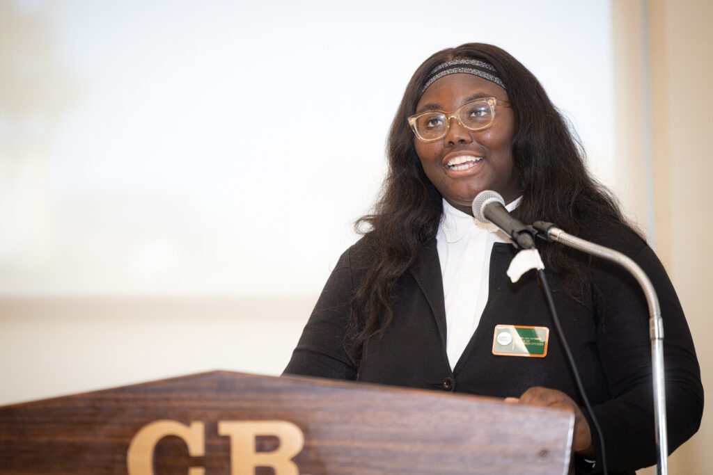 Krysten Hood shares about her experience as a Career Exploration intern and working in the community with the Urban League, during a special closing ceremony this summer. Photo: Justyn Thomas. 
