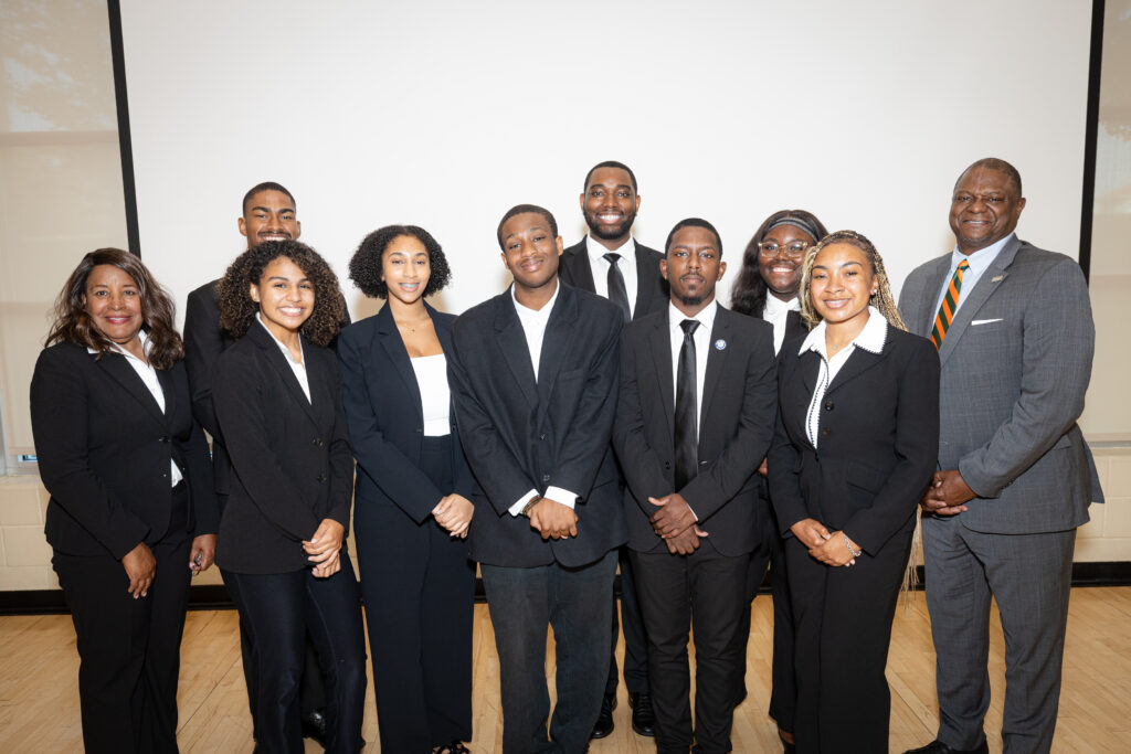 Dr. Doris Roundtree (far left), who leads the Career Exploration Program, celebrates with SJGC interns and former Vice President for University Advancement Dr. Anthony Neal (far right). Interns pictured from left to right (front row): Maricela Carlos-Valentino, Amiracle Baker, Kazon Allen, Michael Trim Jr., and Chloe Waites. Back row: Phillip Woodside and Jarrett Johnson. Photo: Justyn Thomas.
