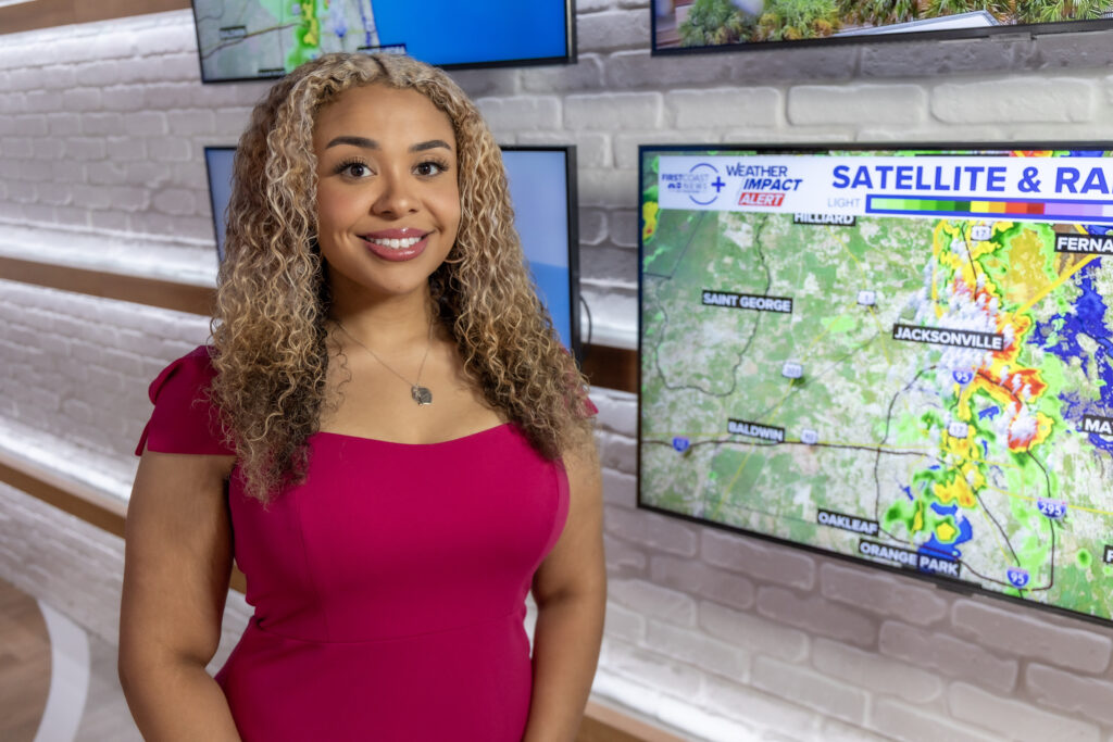 Autumn Dancy presents the weather during her TEGNA internship at First Coast News, where she combined science and journalism to deliver forecasts.