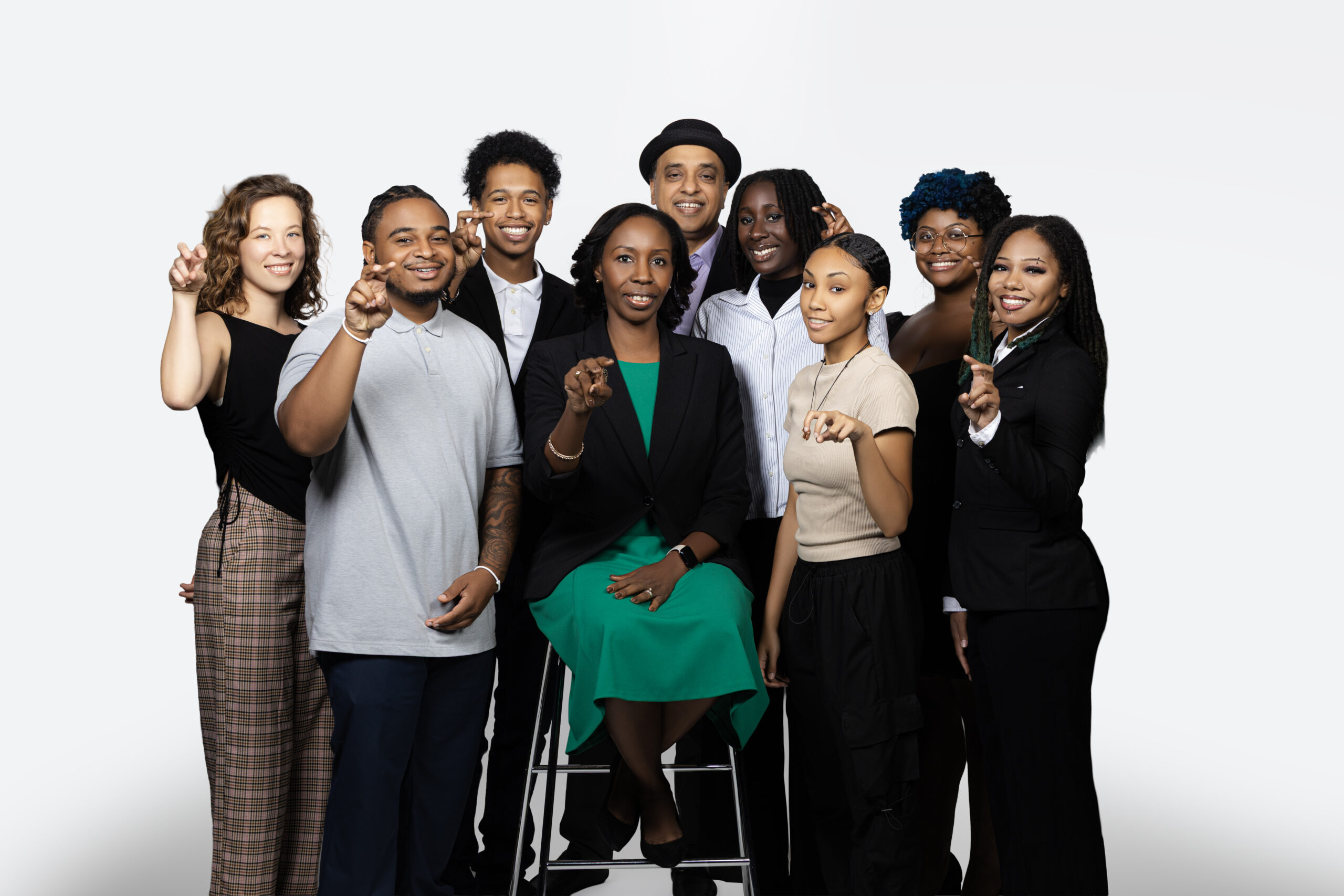 FAMU SJGC Dean Mira Lowe (front row center) and Graphic Communication Division Director Anosh Gill (back row center) celebrate with students who took home top honors among the state’s best and brightest in print and graphic design. Photo: Justyn Thomas.