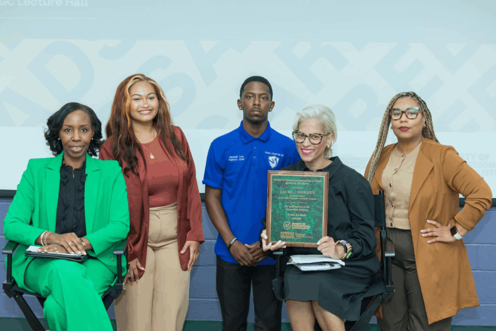 FAMU SPJ chapter leaders, Sydney Mclennan, Michael Trim Jr. and Shontae Day, celebrate a successful Fireside Chat with Dean Mira Lowe (left) and Laura J. Downey (center right) in 2024. Downey is the trailblazing first Black president of the SPJ Georgia Pro Chapter and an executive editor at WebMD. Although not pictured, Tatyanna McCray also played a significant role in leading the chapter's support of the event, which garnered them national honors. Photo: AJ Shorter.