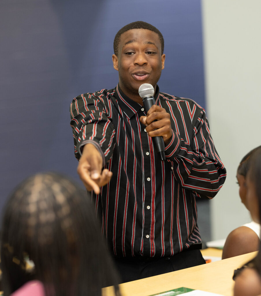 Kazon Allen is pictured encouraging classmates.