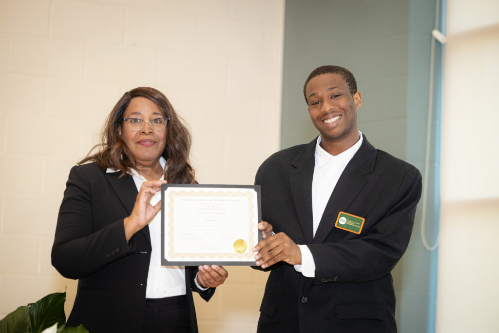 Kazon pictured with Director Doris Roundtree, Ph.D.