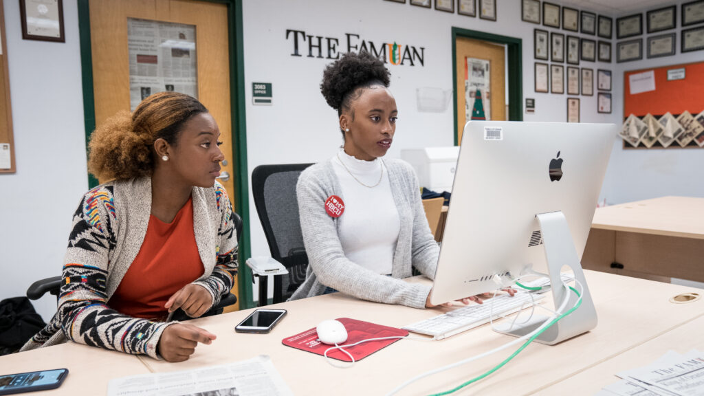 Students learning at computers.