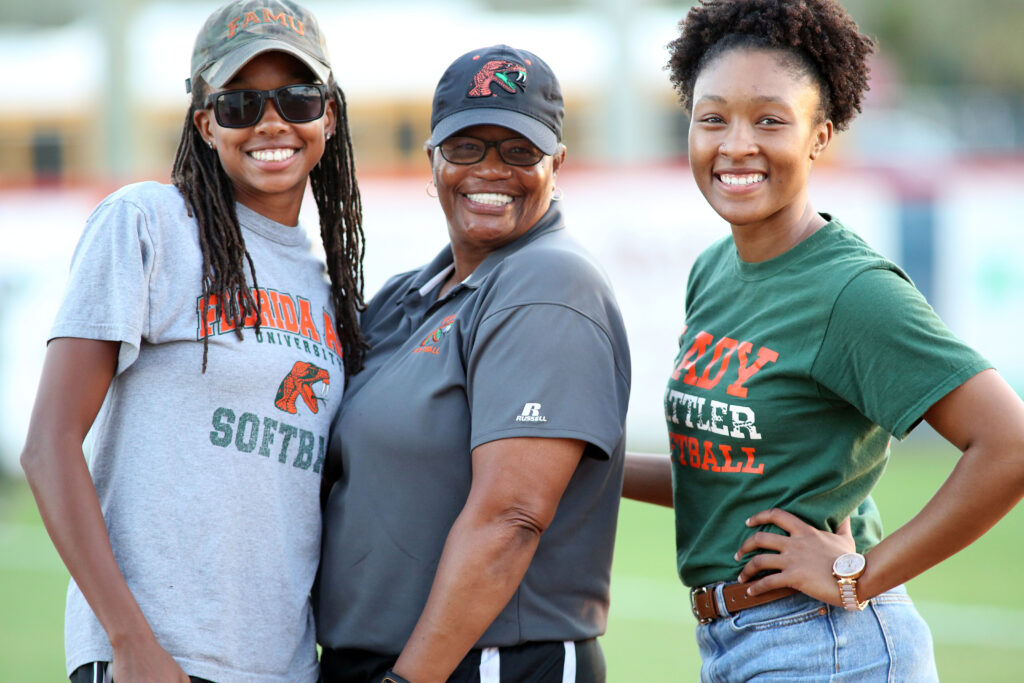 Coach Wiggins with former players.