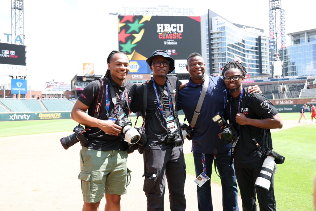 Kyrease Desseau at the Swingman Classic with other HBCU photographers.