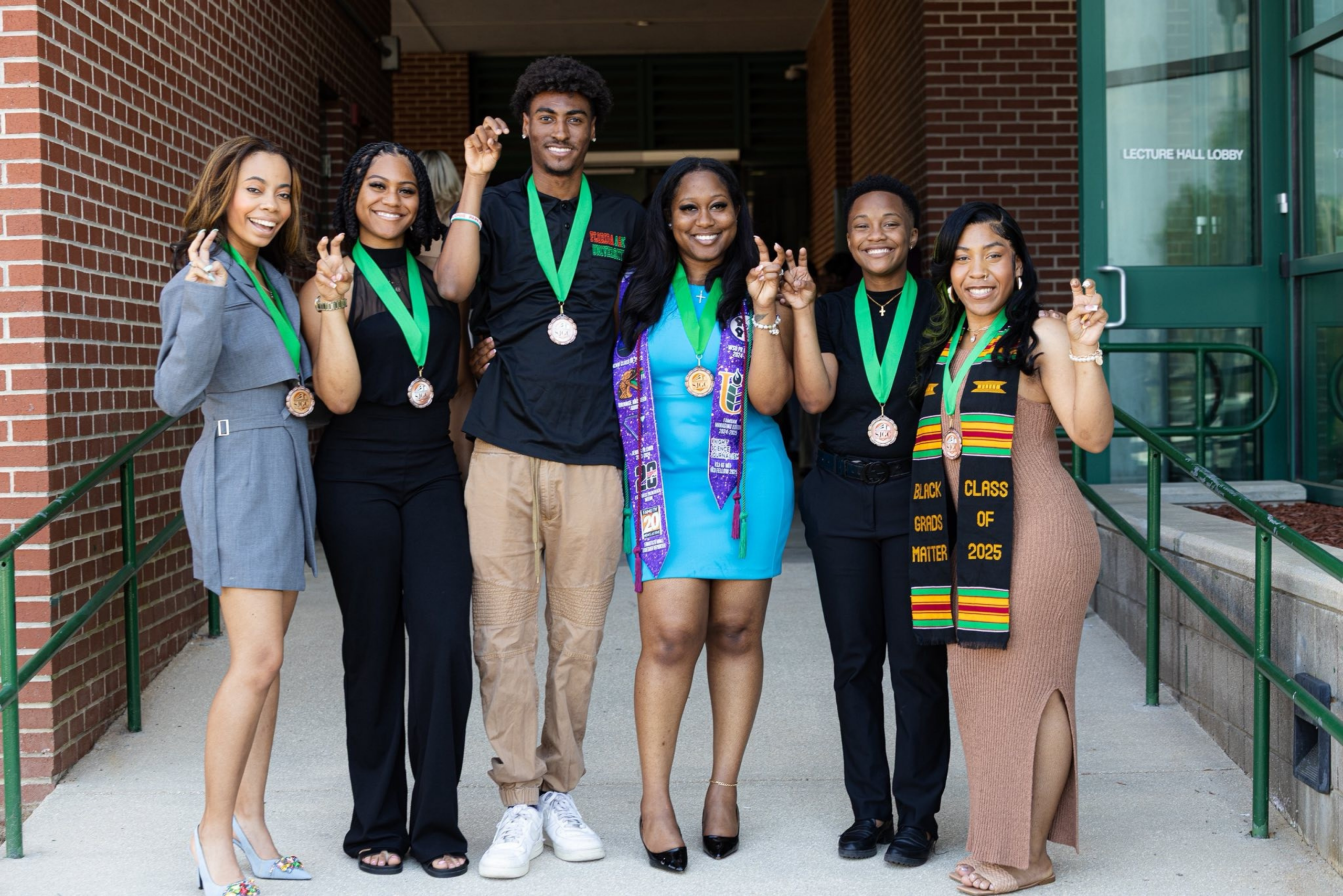 Students pictured celebrating.